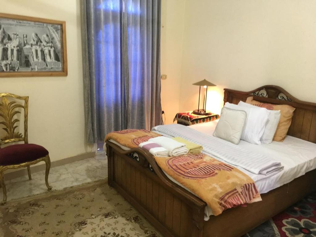 Postel nebo postele na pokoji v ubytování Sakkara Inn hotel