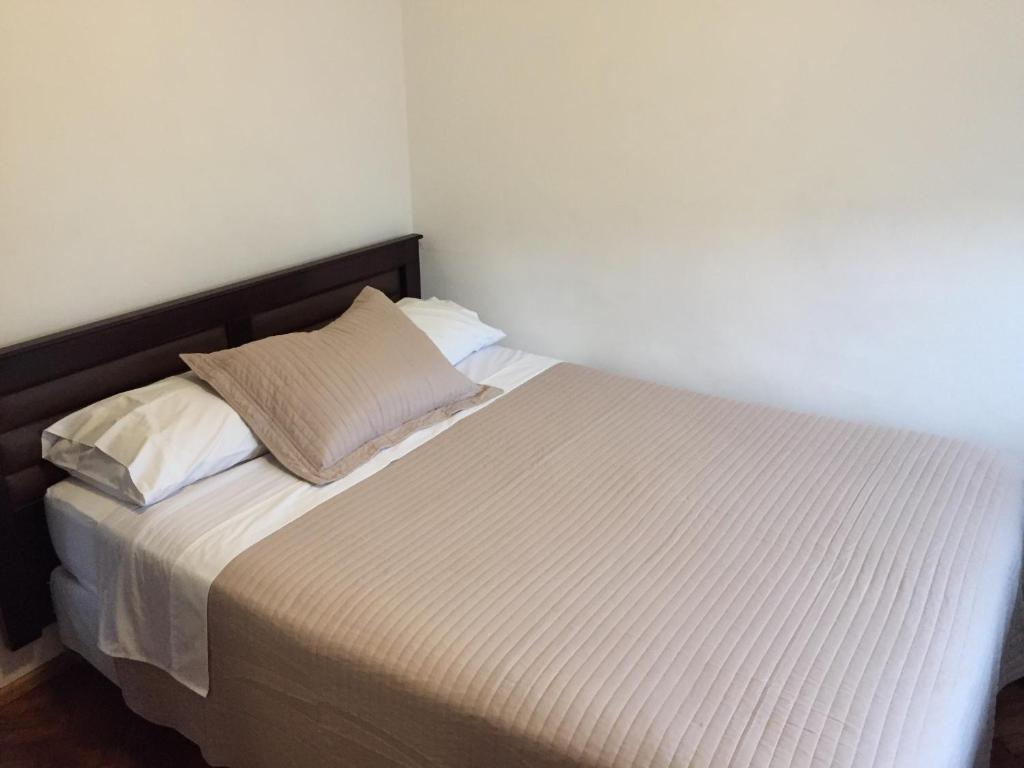Postel nebo postele na pokoji v ubytování Hostal Recreo