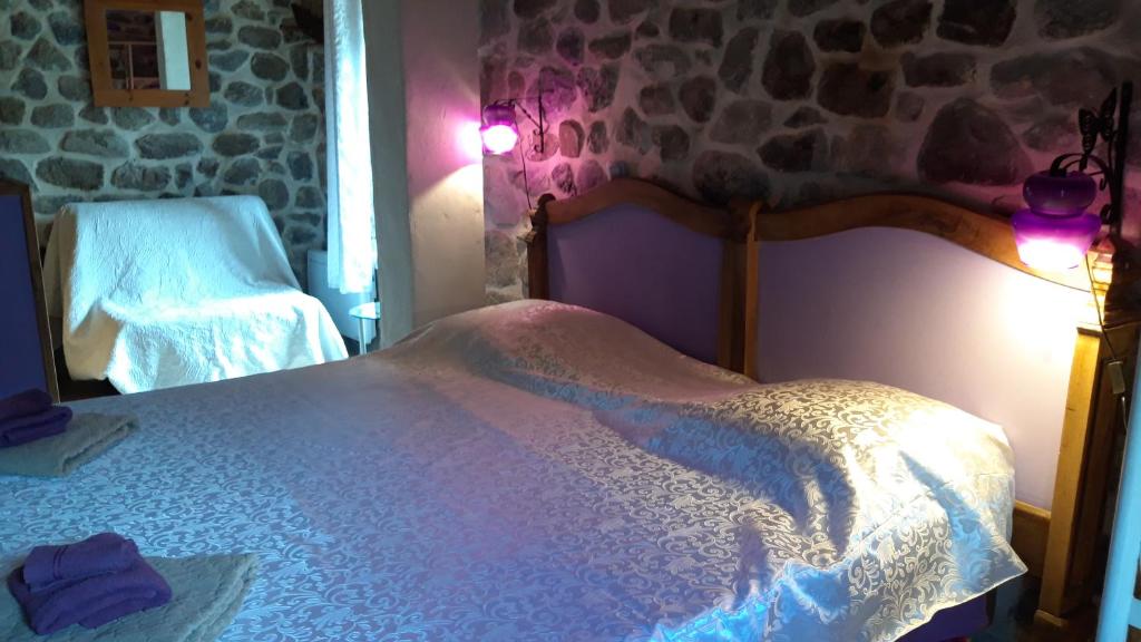 Postel nebo postele na pokoji v ubytování La myrtilleraie