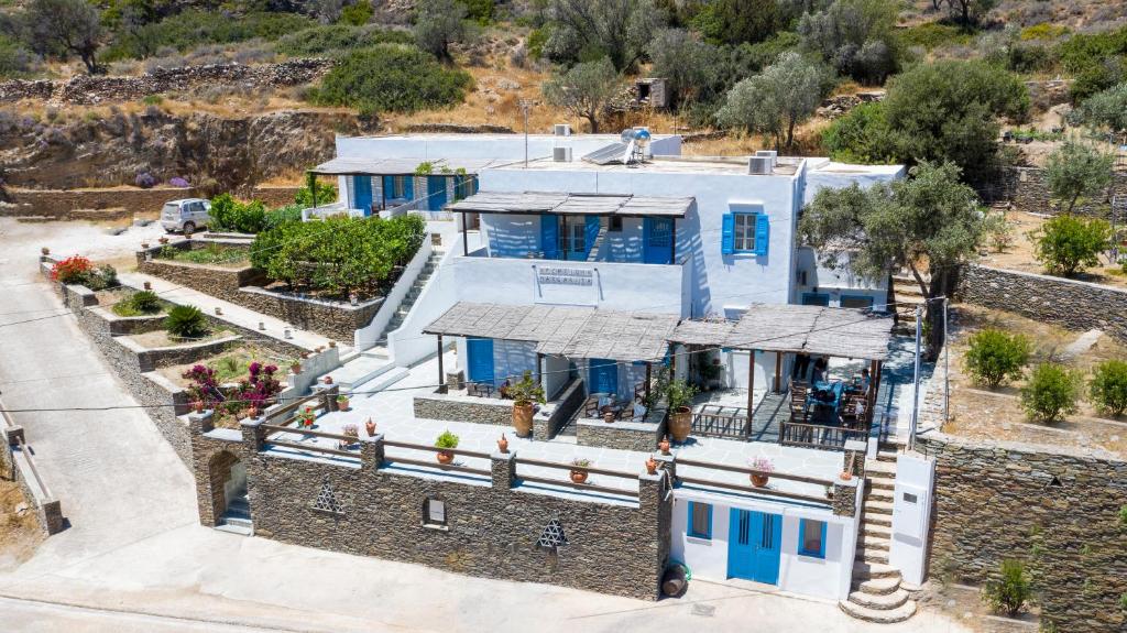 an overhead view of a house with blue doors at Rita Rooms Sifnos in Platis Gialos
