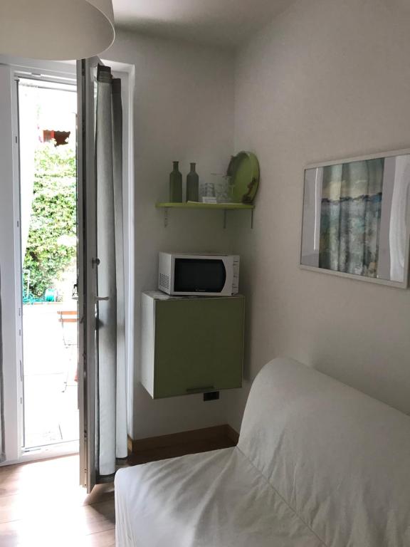 Postel nebo postele na pokoji v ubytování Green Corner Gelsomino