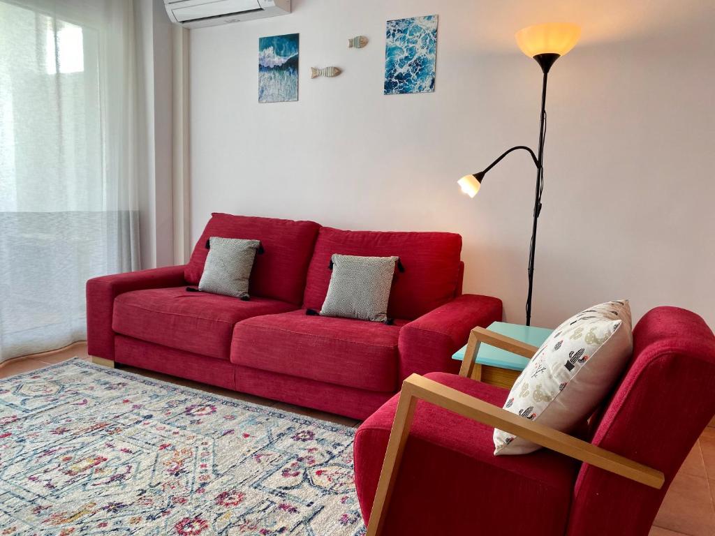 A seating area at Apartamentos Plus Costa Brava Pals