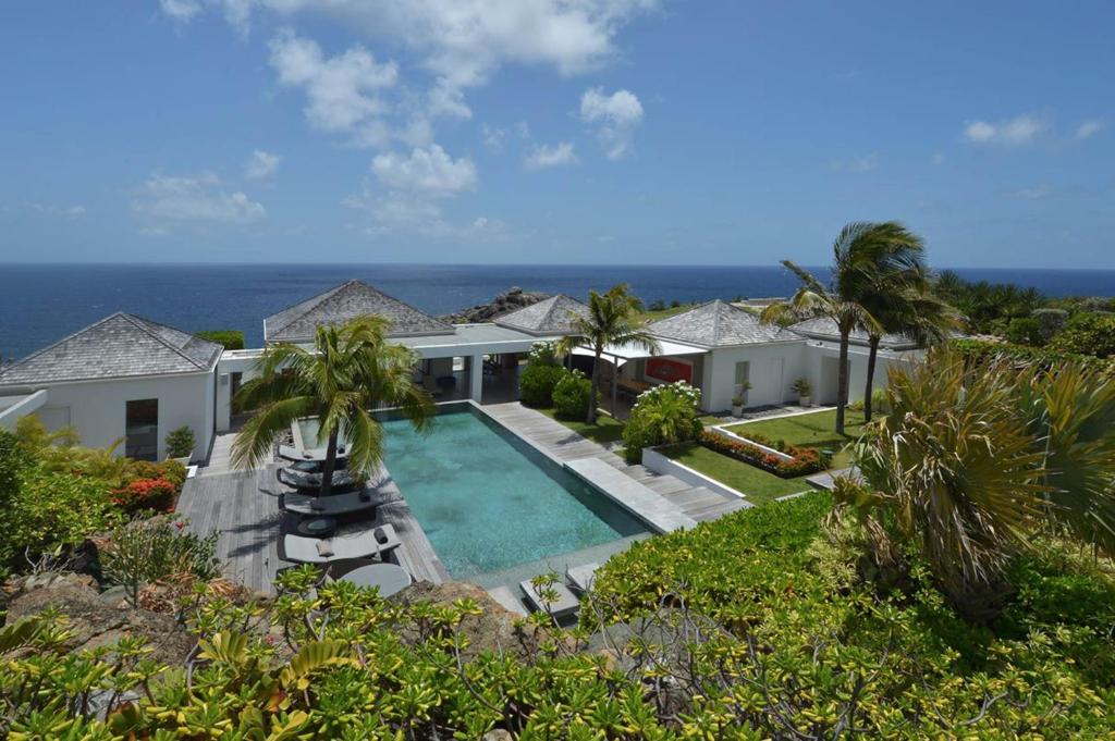 an aerial view of a house with a swimming pool at Dream Villa Petit Cul de Sac 720 in Saint Barthelemy