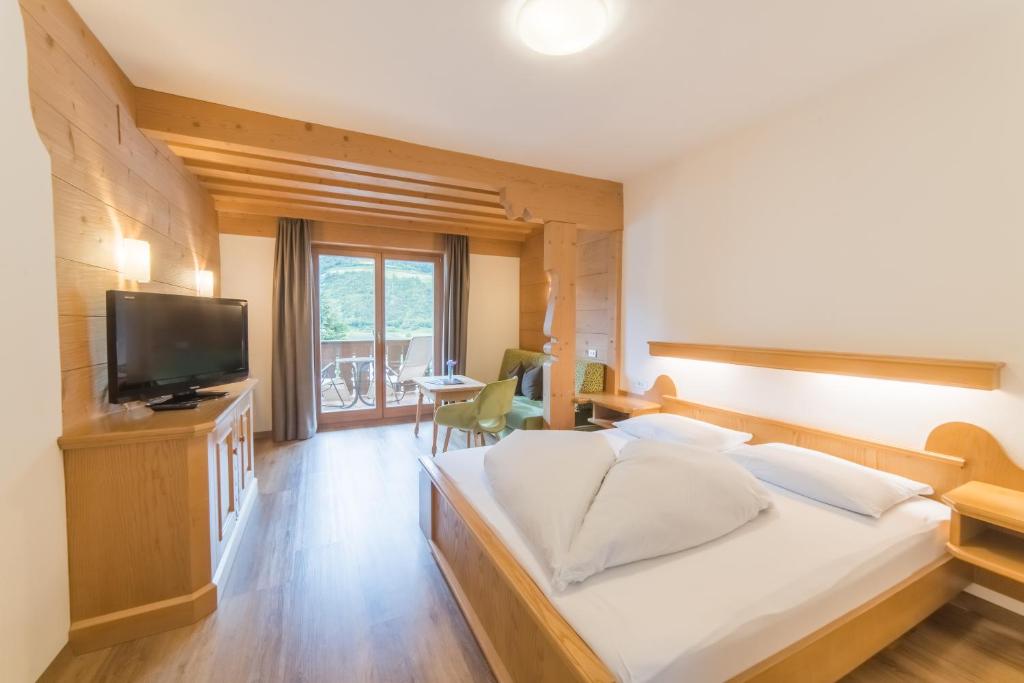 Sjónvarps- og/eða afþreyingartæki á Pension Apartments Pardell