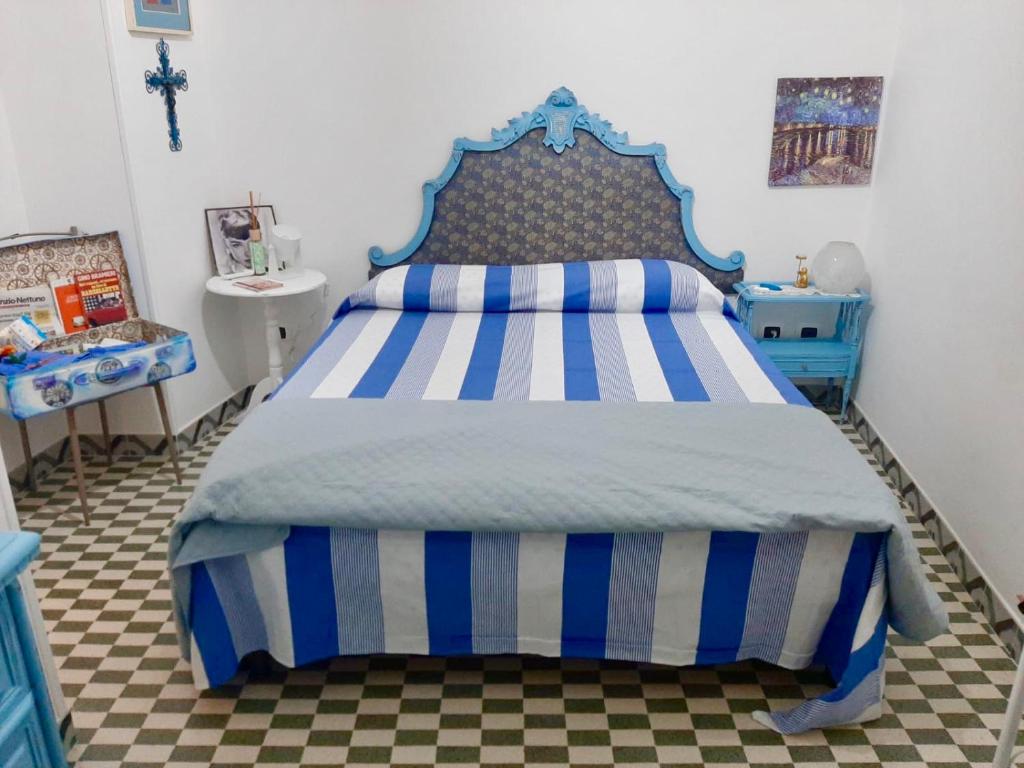Posteľ alebo postele v izbe v ubytovaní La finestrella dell’arte un orizzonte da guardare