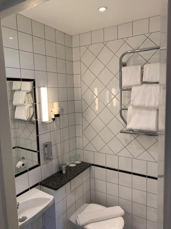 Koupelna v ubytování Mayfair Hotel Tunneln