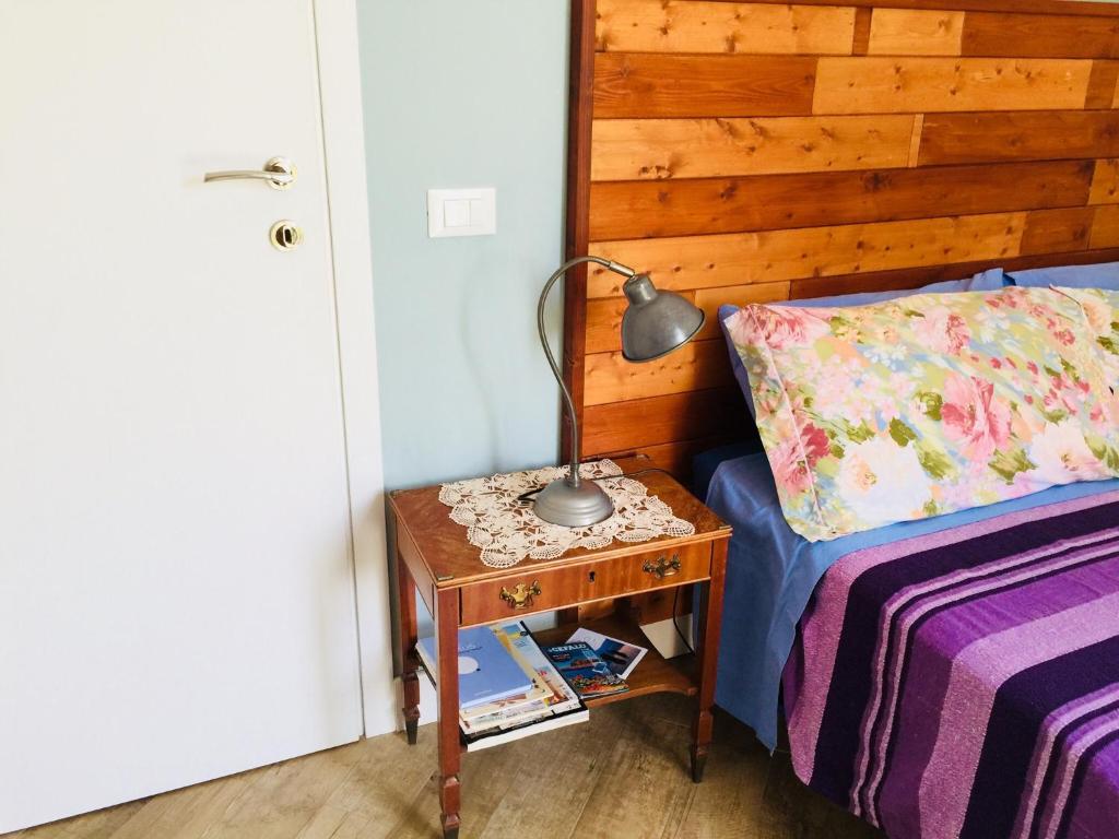 A bed or beds in a room at Gò Gò House 2 Casa Aprile