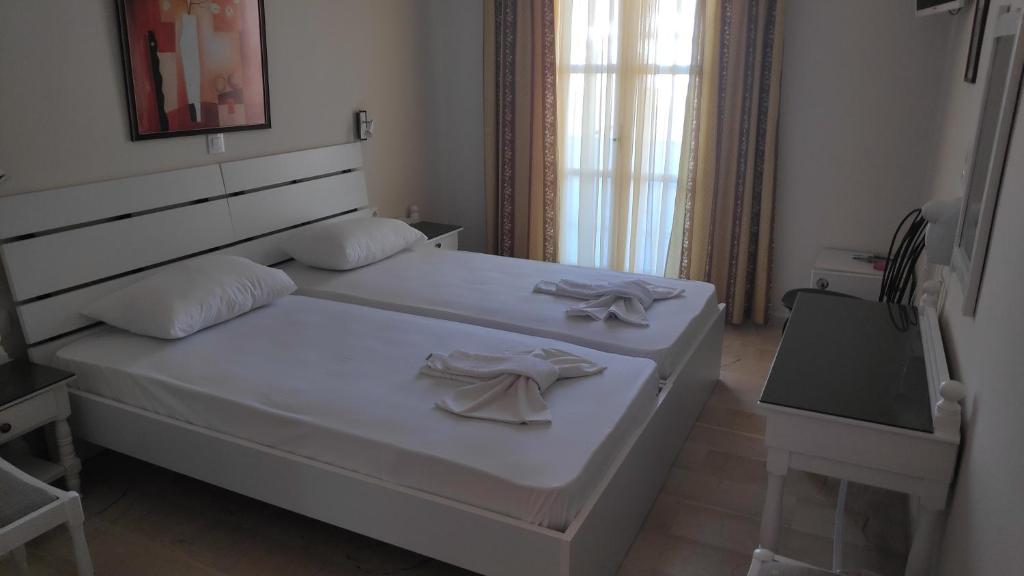 Llit o llits en una habitació de Mare Monte