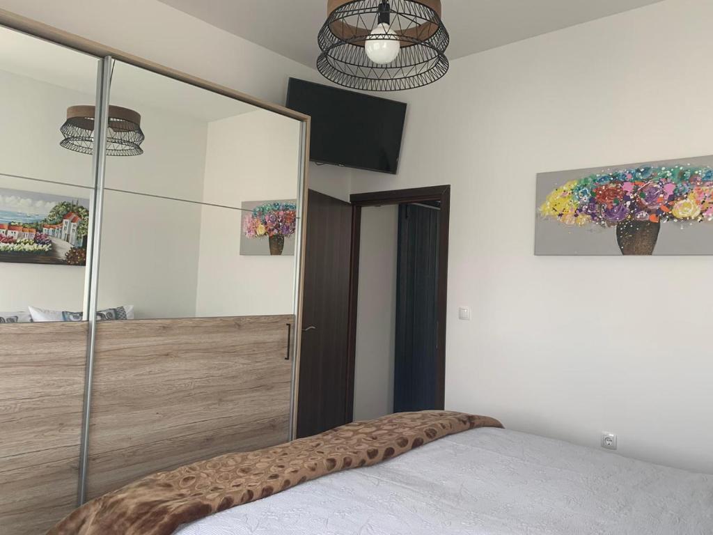 Łóżko lub łóżka w pokoju w obiekcie La Dolce Vita Apartment