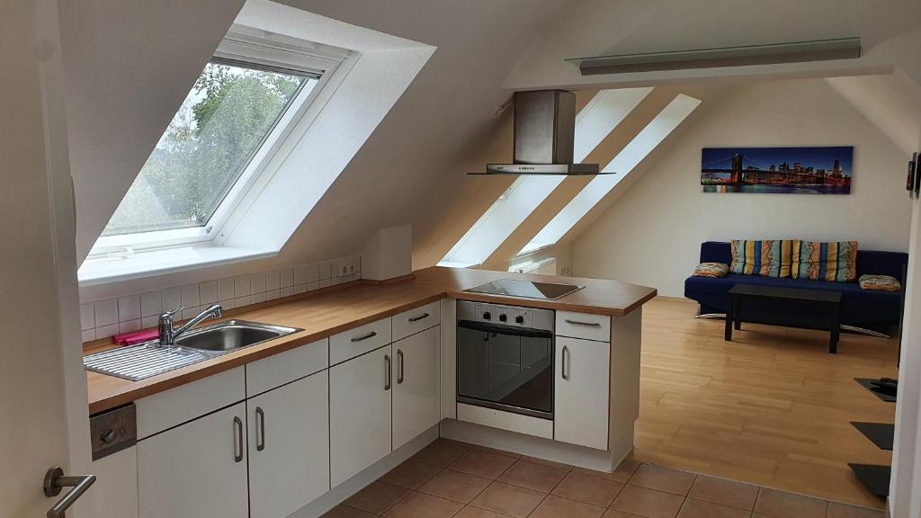 Kuchyň nebo kuchyňský kout v ubytování Ferienwohnung mit See- und Waldblick