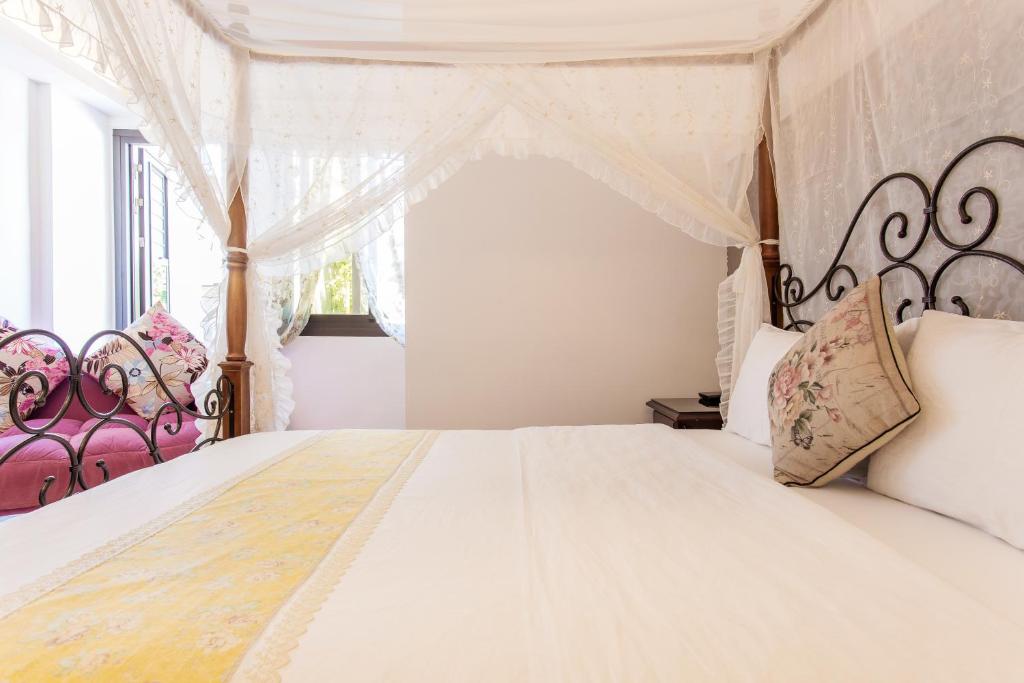 Postel nebo postele na pokoji v ubytování Hometown B&B