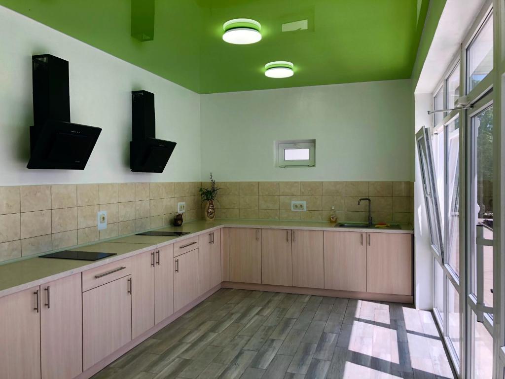 Kuchyň nebo kuchyňský kout v ubytování Sofia Hotel