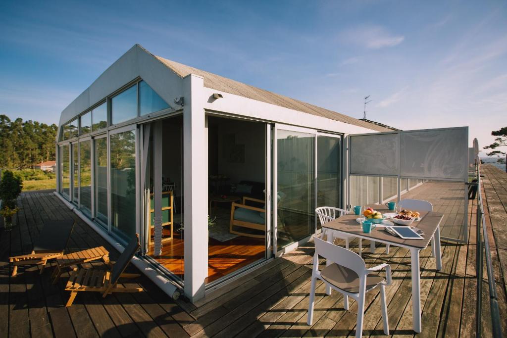 A balcony or terrace at roomAREA vivienda turistica