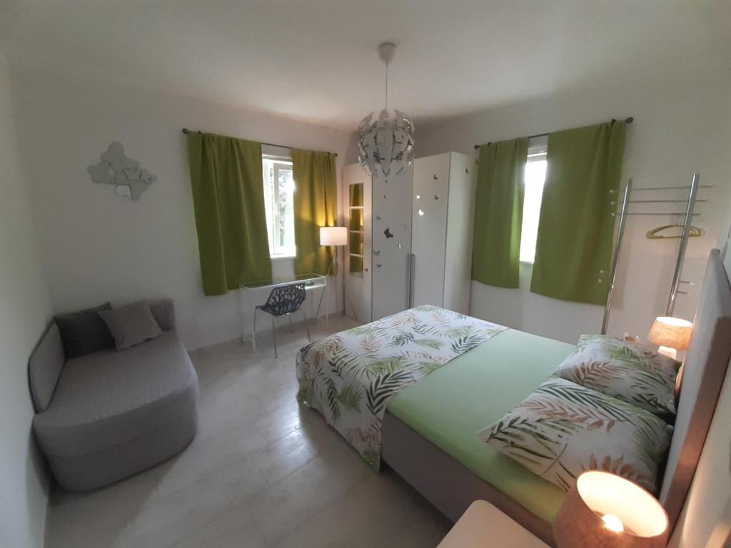 Postel nebo postele na pokoji v ubytování Apartment Mia