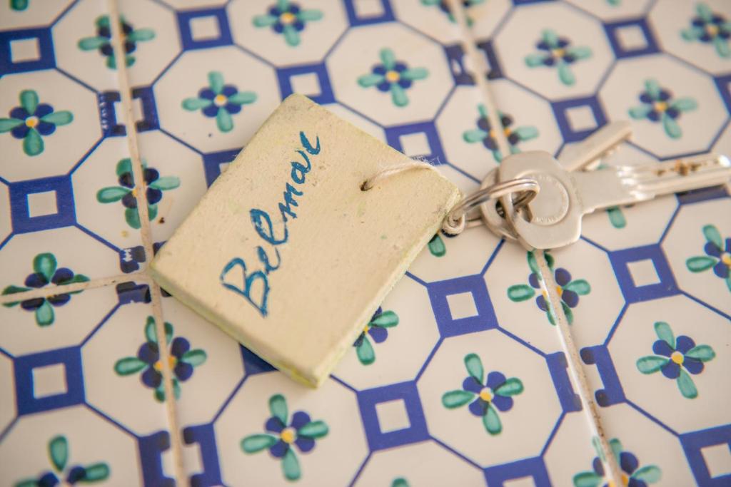 a tag with the word new attached to a key chain at Belmar in Gaeta