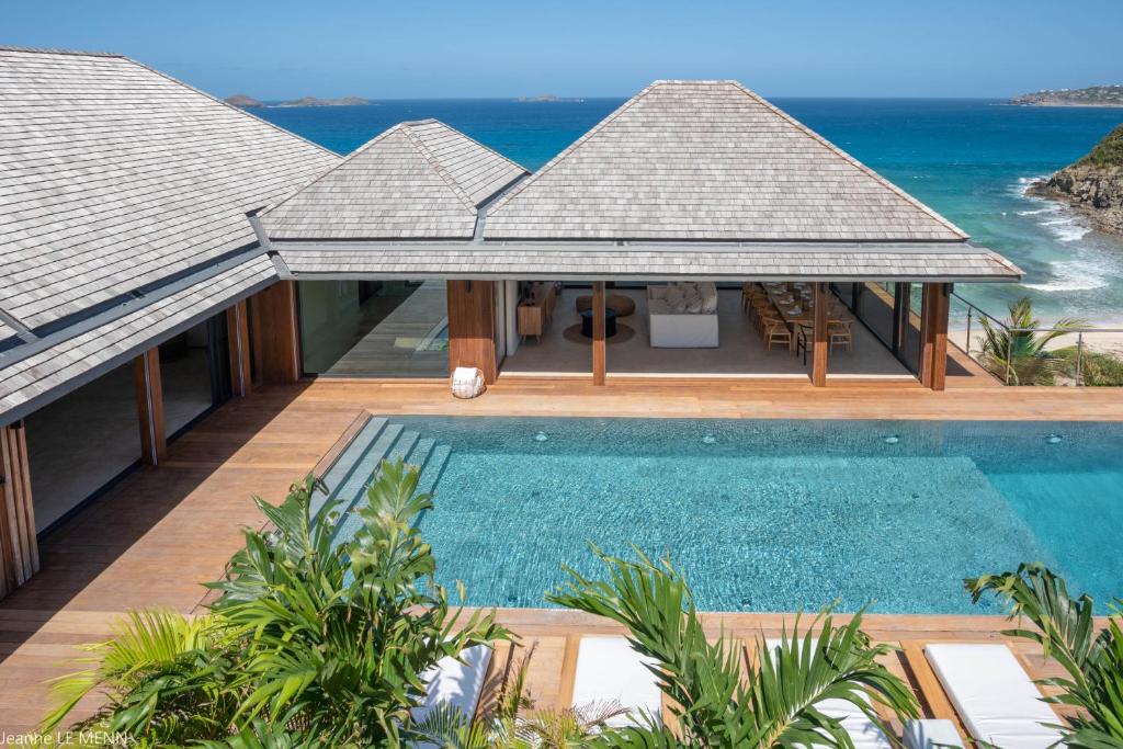 an aerial view of a villa with a swimming pool at Dream Villa Anse des Cayes 809 in Anse des Cayes