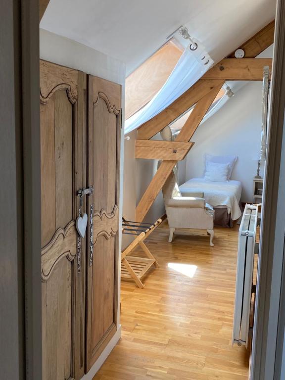Postel nebo postele na pokoji v ubytování Chambres d hôtes La Suite du 12