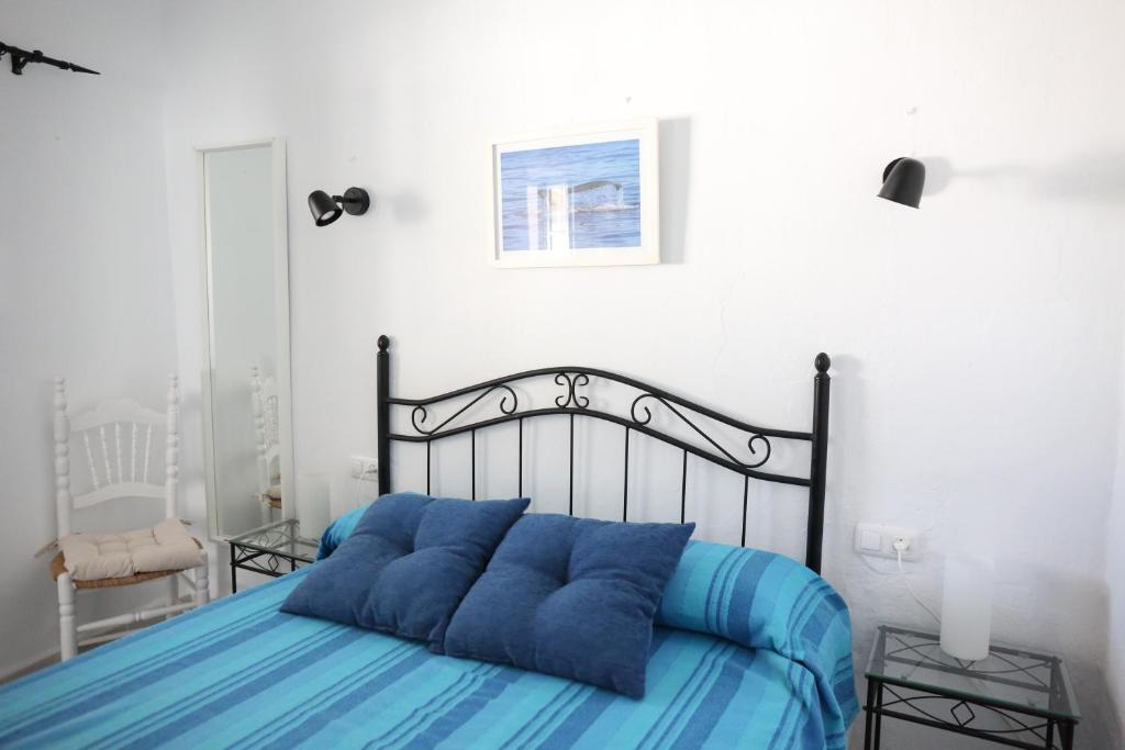 Postel nebo postele na pokoji v ubytování Vivienda de Alojamiento Rural Casa Naty