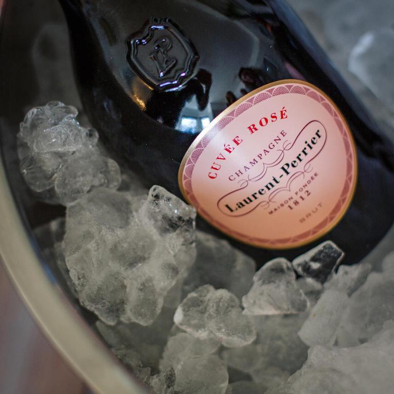 a bottle of wine in a bucket of ice at Blakeney House in Blakeney