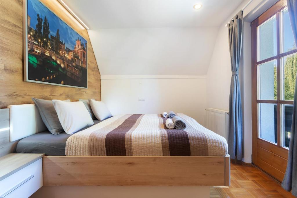 Postel nebo postele na pokoji v ubytování Vila Grad Bled - Sauna & Hot tub