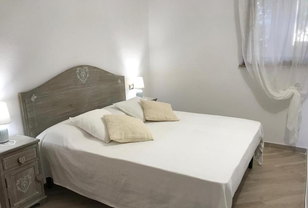 Postel nebo postele na pokoji v ubytování Holiday House Palau