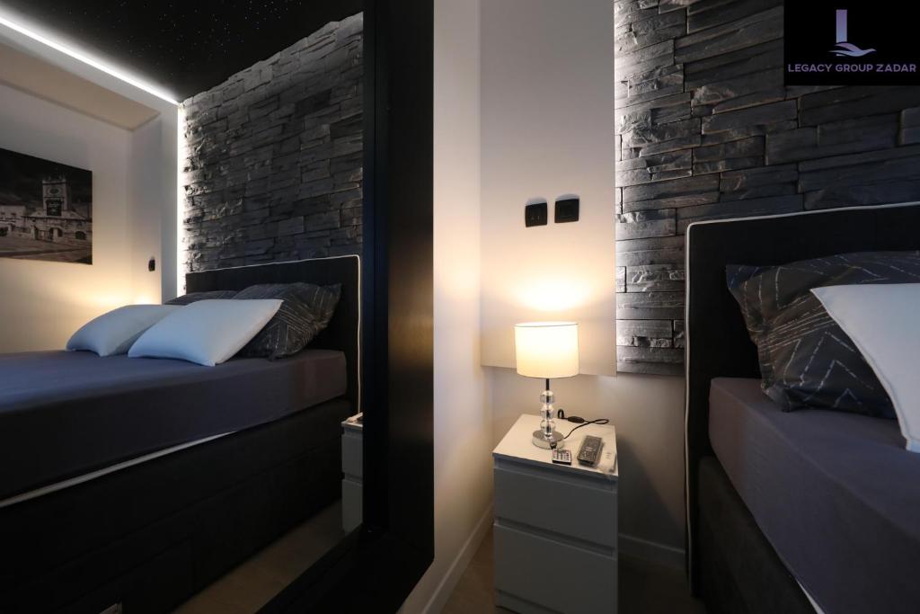 Posteľ alebo postele v izbe v ubytovaní Legacy Marine2 - Zadar, Luxury Suites