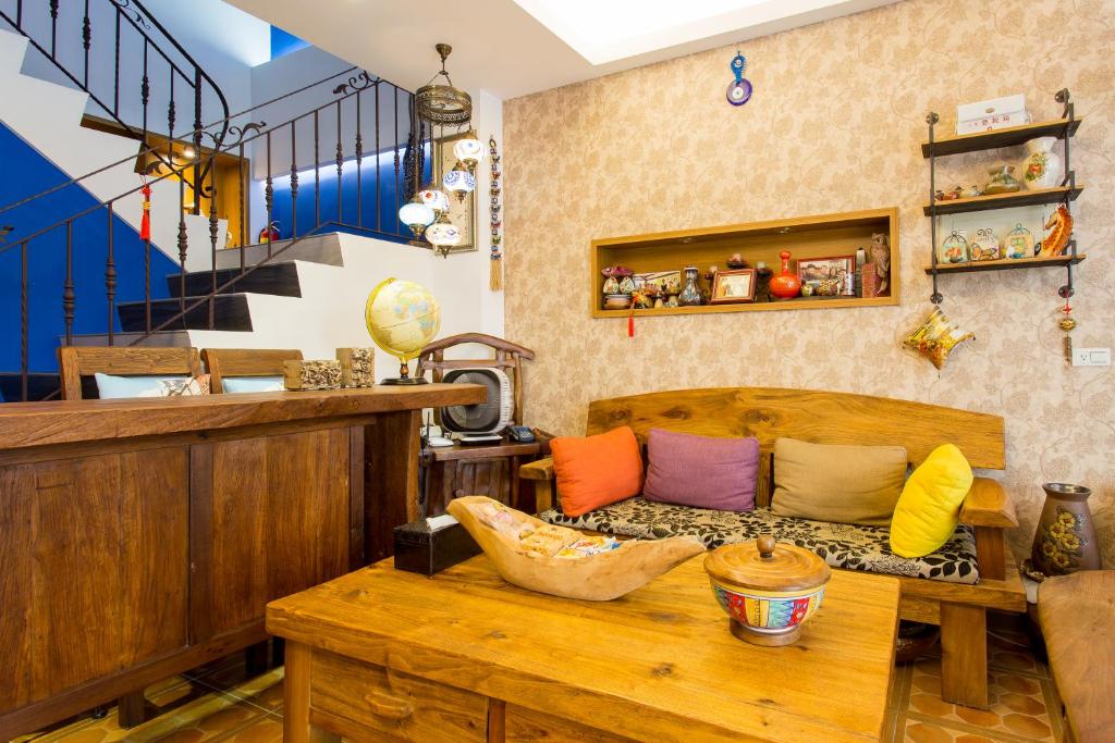 a living room with a couch and a table at Hometown B&B in Hualien City