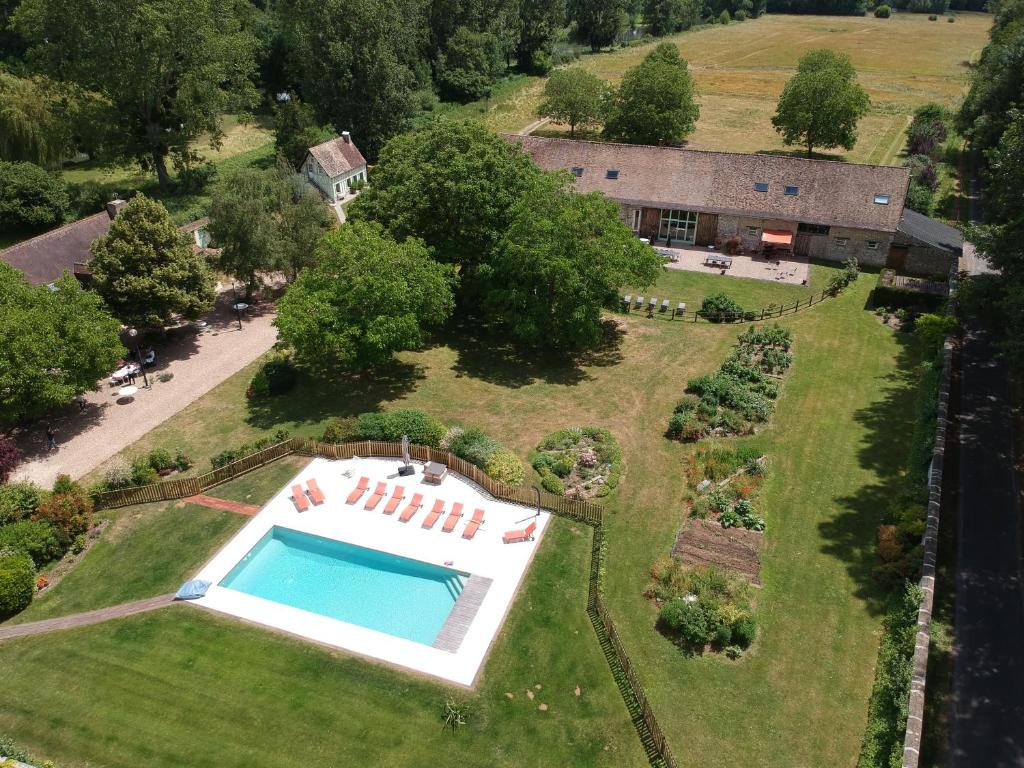 an aerial view of an estate with a swimming pool at La Ferme des Isles in Authouillet