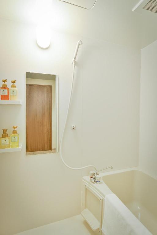 Koupelna v ubytování ikoi HOTEL