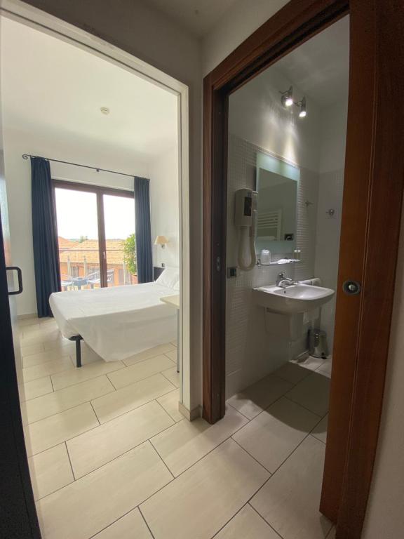 Koupelna v ubytování Hotel La Locanda