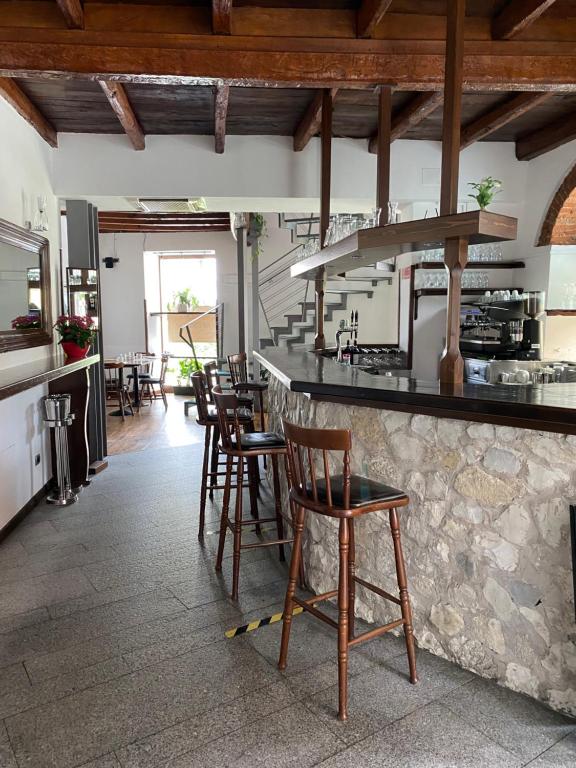 Kuchyň nebo kuchyňský kout v ubytování Hotel La Locanda