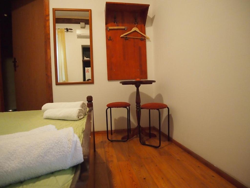 Postel nebo postele na pokoji v ubytování Rooms & Studio Stipcic