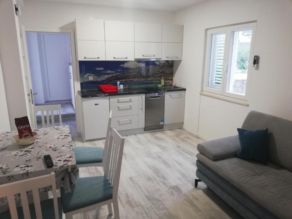 Kuchyň nebo kuchyňský kout v ubytování Apartments Villa Ravlić