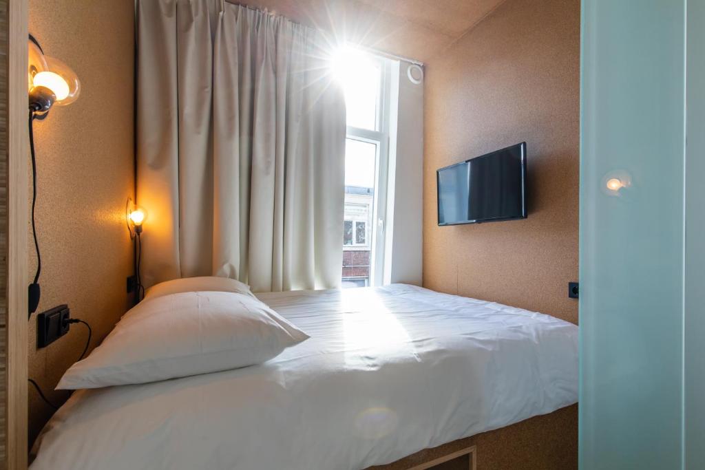 Postel nebo postele na pokoji v ubytování the bellhop