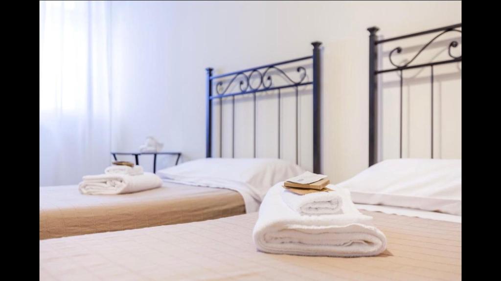 Postel nebo postele na pokoji v ubytování B&B Happiness - City Center