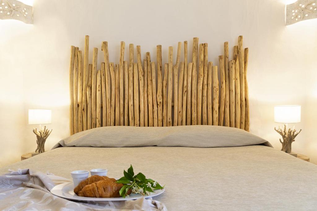 Łóżko lub łóżka w pokoju w obiekcie Residence Capraggia