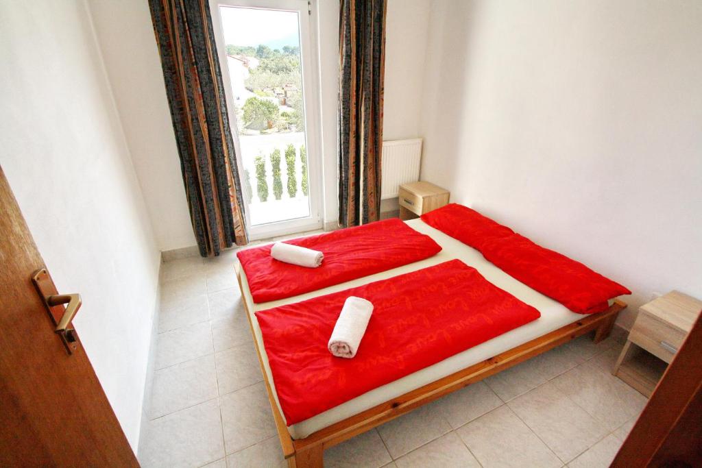Posteľ alebo postele v izbe v ubytovaní Apartments Lemeš