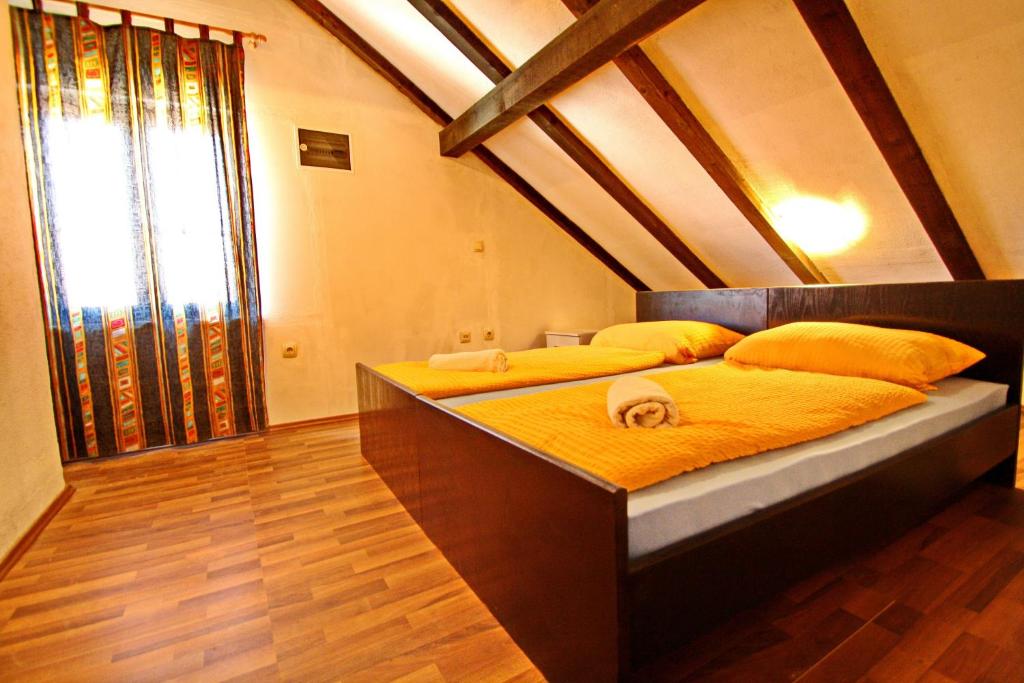 Posteľ alebo postele v izbe v ubytovaní Apartments Lemeš