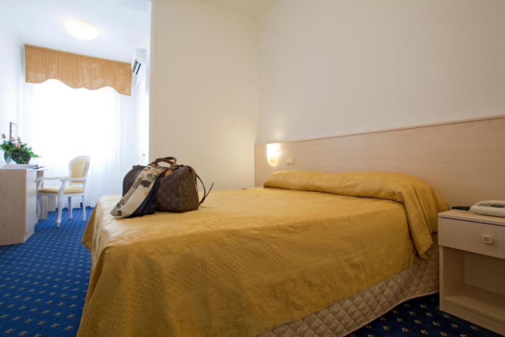 Postel nebo postele na pokoji v ubytování Hotel Terme Venezia