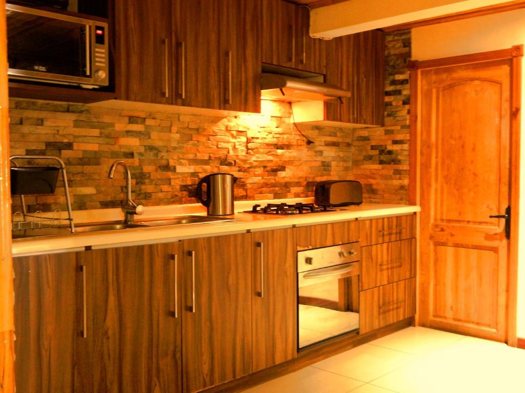 Una cocina o cocineta en Hostal Plaza Maule