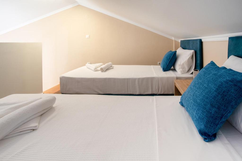 Postel nebo postele na pokoji v ubytování Valery Apartments