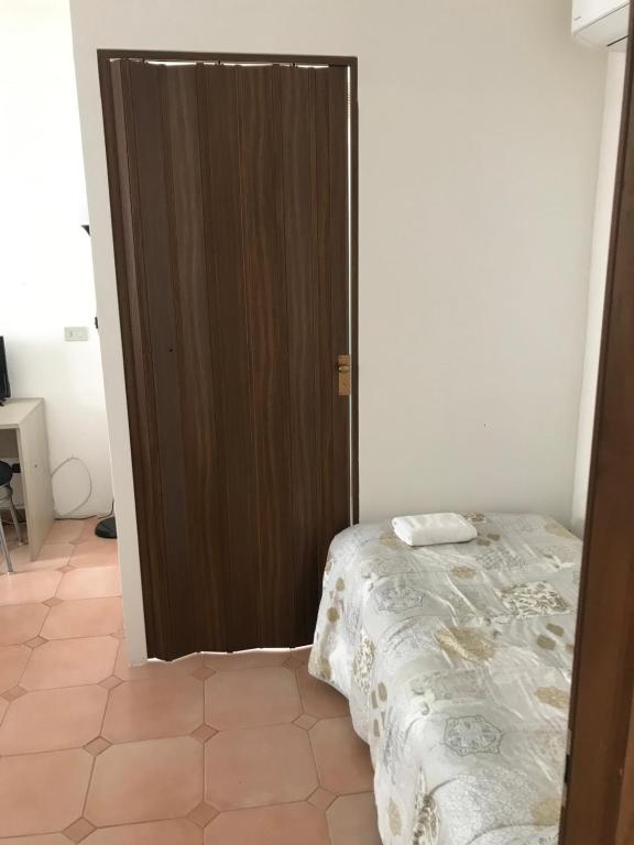 Postel nebo postele na pokoji v ubytování B&B MIke