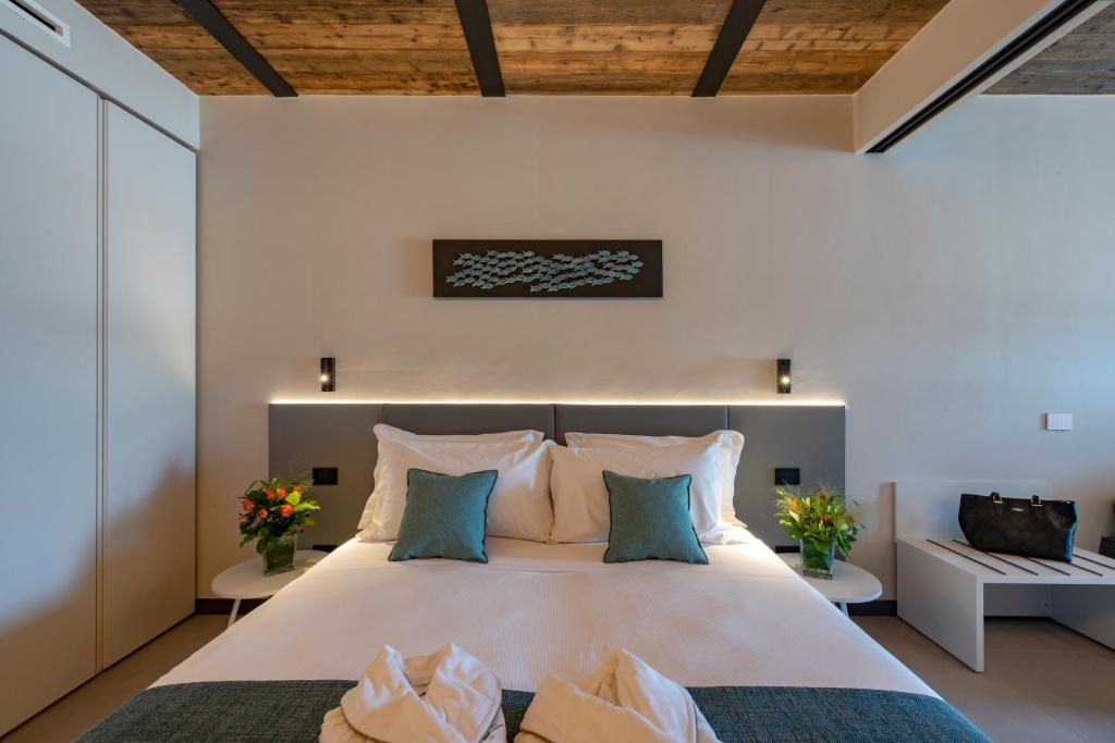Postel nebo postele na pokoji v ubytování Ca' Amae Portovener e