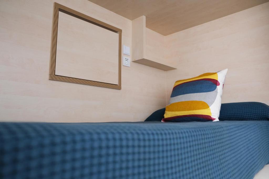 Posteľ alebo postele v izbe v ubytovaní TAKE SURF Hostel Conil