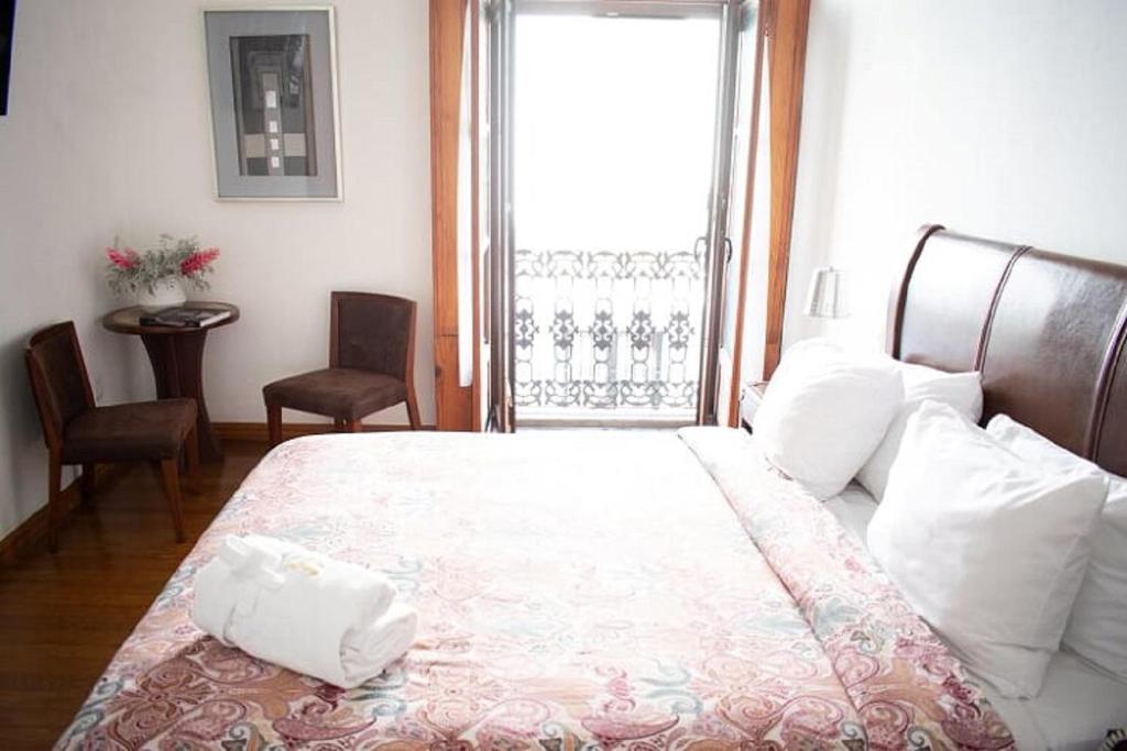 Postel nebo postele na pokoji v ubytování Casa Aspeytia Hotel Boutique