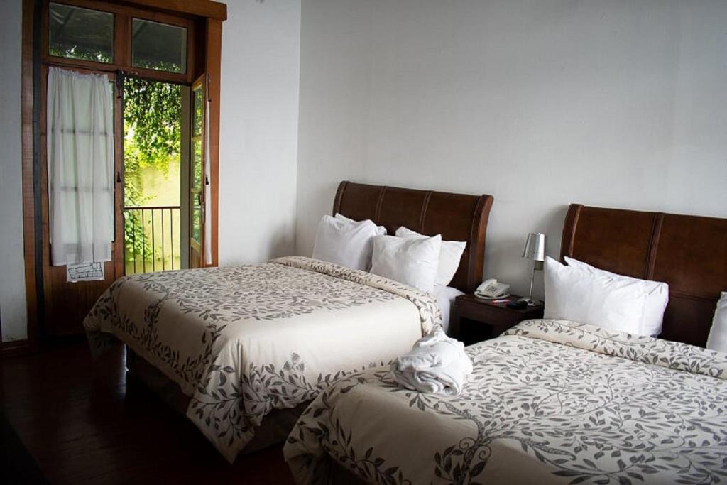 Postel nebo postele na pokoji v ubytování Casa Aspeytia Hotel Boutique