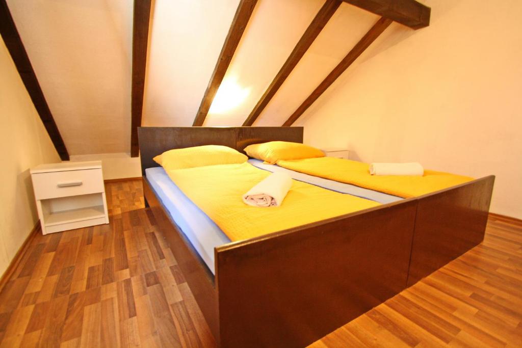 Posteľ alebo postele v izbe v ubytovaní Apartments Lemeš