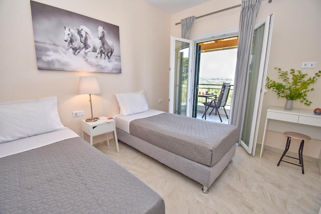 A bed or beds in a room at Villa Caesar