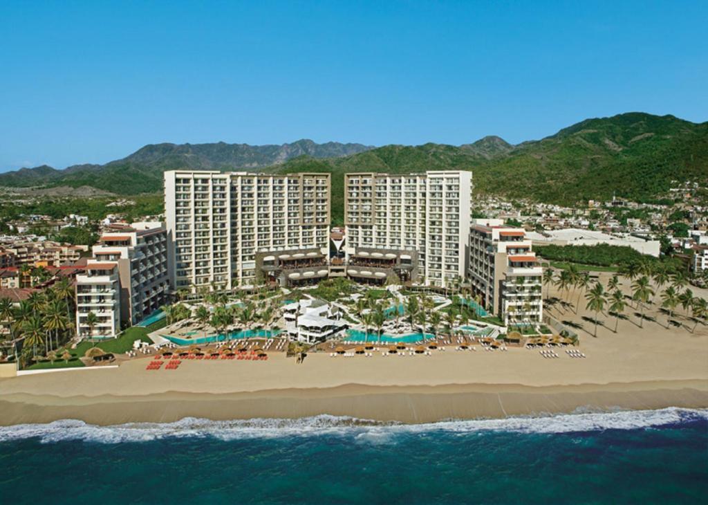 an aerial view of a resort on the beach at Dreams Vallarta Bay Resorts & Spa - All Inclusive in Puerto Vallarta