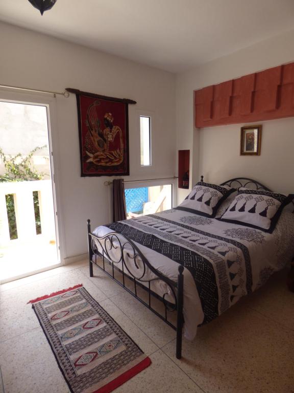 Una cama o camas en una habitación de Janna d'Ifni